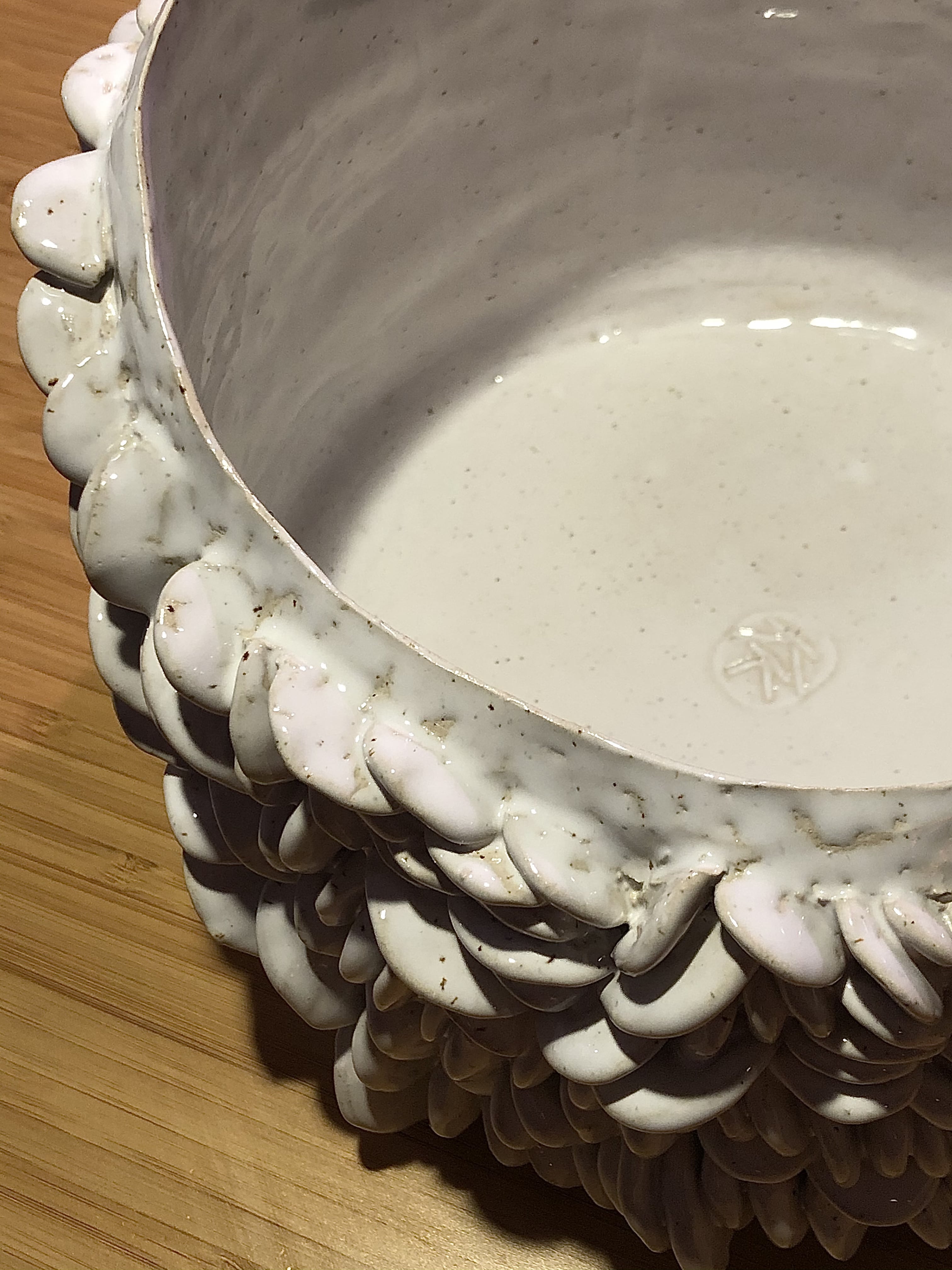 white, ceramic, plant pot from a side